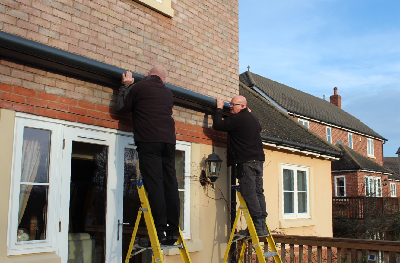 Team Installing a Patio Awning